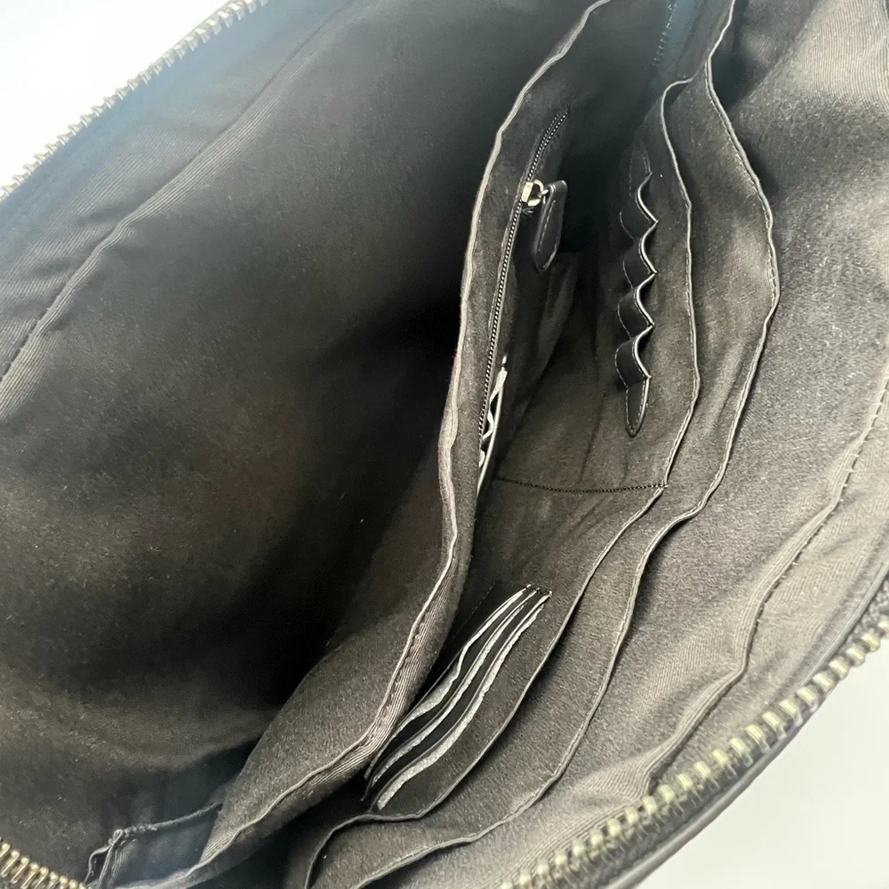 Coach Slim Brief In Signature Canvas With Trolley Sleeve